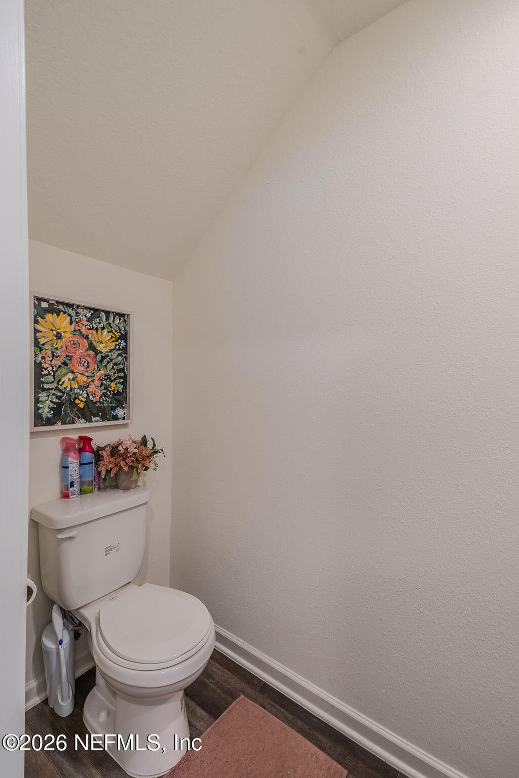 45148 Red Brick Drive Callahan, FL 32011 - Photo 12 of 32 a bathroom with a toilet a sink and a mirror