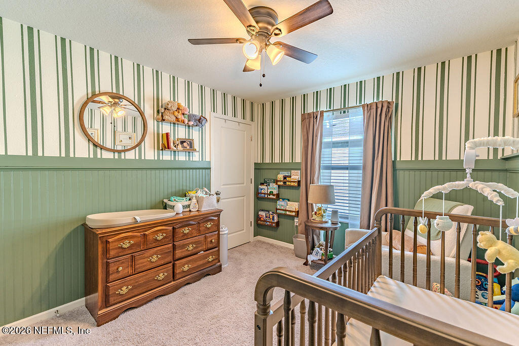 45148 Red Brick Drive Callahan, FL 32011 - Photo 17 of 32 a bedroom with furniture and a window