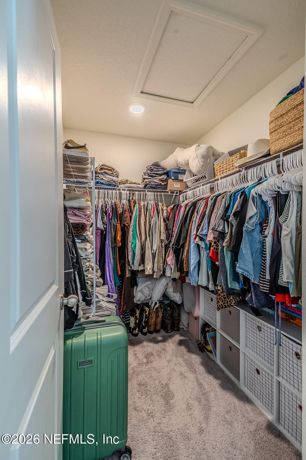 45148 Red Brick Drive Callahan, FL 32011 - Photo 22 of 32 a view of walk in closet with clothes