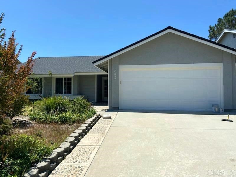 3587 Winslow Road Oceanside, CA 92056 - Photo 1 of 1 a front view of a house with a yard