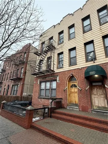 a view of a house with a street