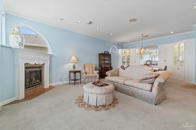 a kitchen with a stove a sink and a refrigerator