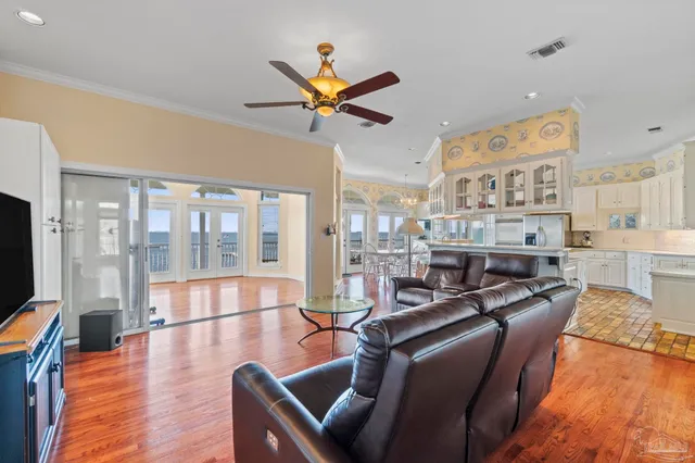 a bedroom with furniture window and wooden floor