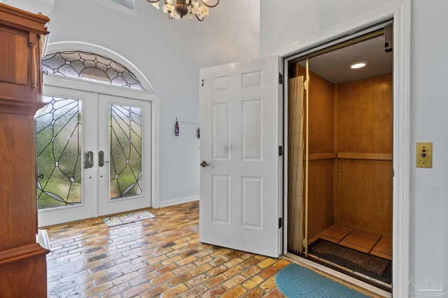 a bathroom with a sink a vanity a mirror and bathtub