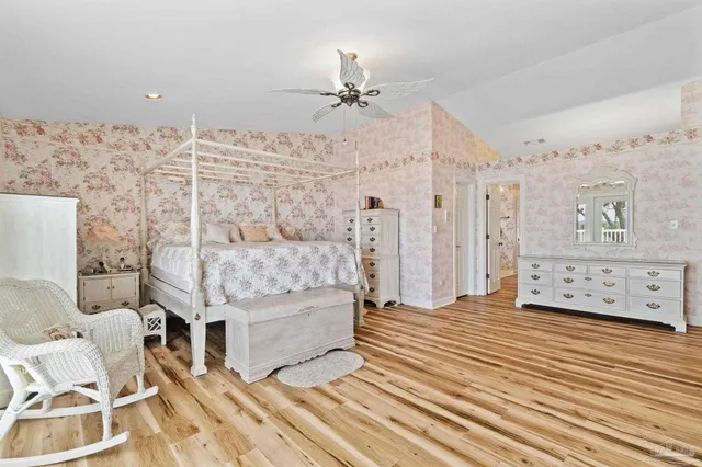 a bathroom with a sink vanity granite and a mirror