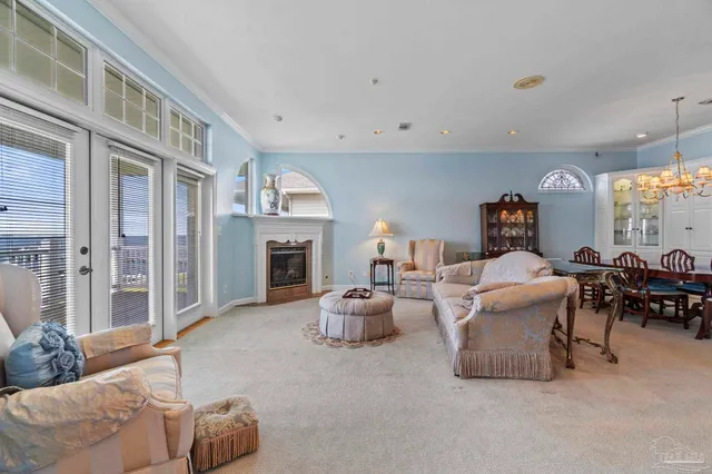 a living room with furniture a fireplace and a fireplace