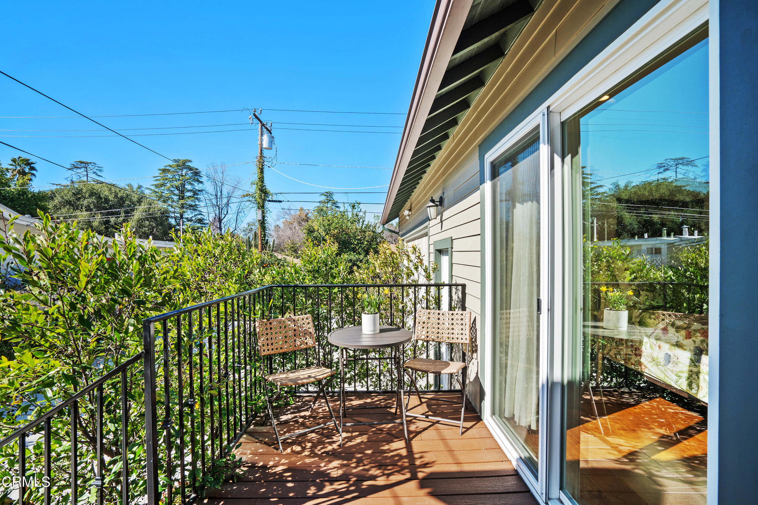 1465 Wesley Avenue Pasadena, CA 91104 - Photo 10 of 11 a view of a balcony with many windows