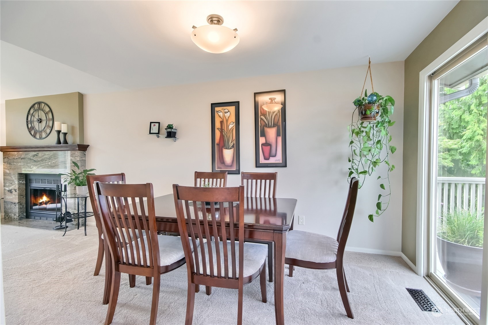 3622 Southeast 19th Court Renton, WA 98058 - Photo 8 of 37 a view of a dining room with furniture window and wooden floor