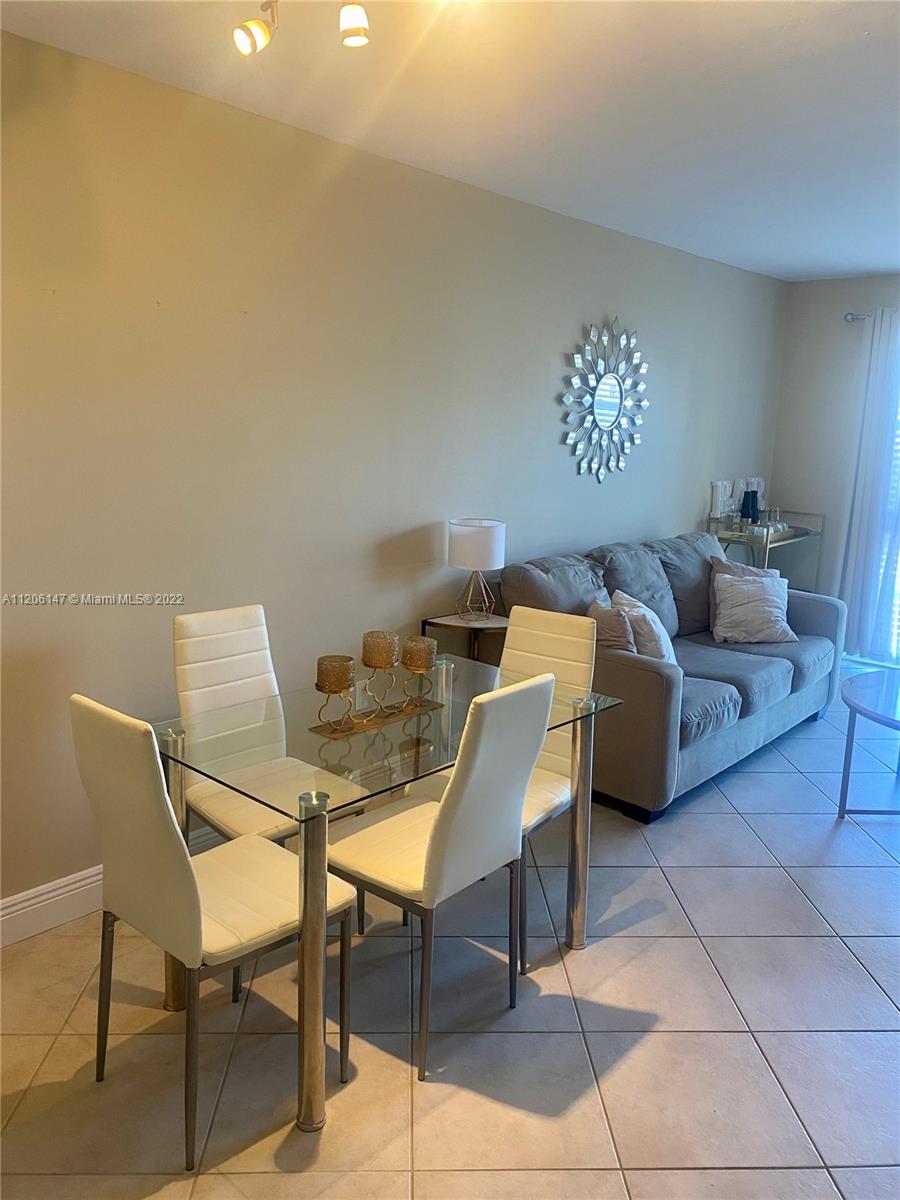 2351 Douglas Road, Unit 605 Miami, FL 33145 - Photo 7 of 10 a view of a livingroom with furniture