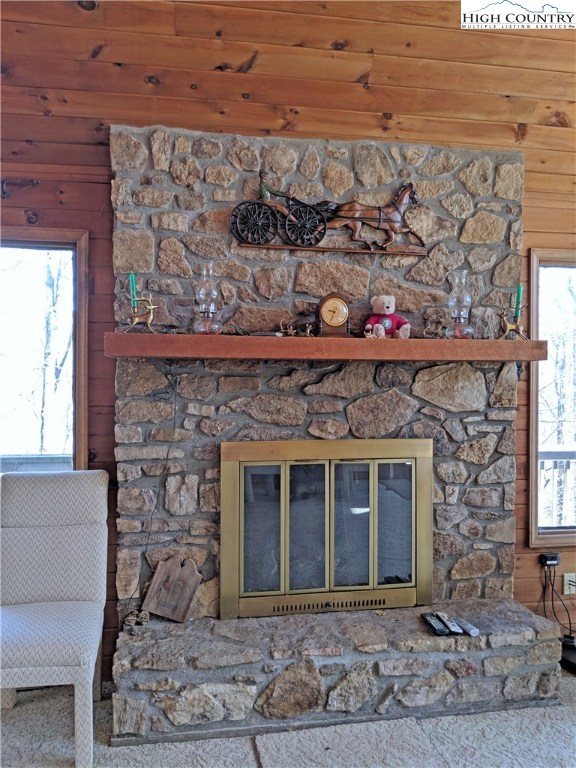 296 Grousemoor Road Deep Gap, NC 28618 - Photo 2 of 27 a front view of a stone house with a fireplace