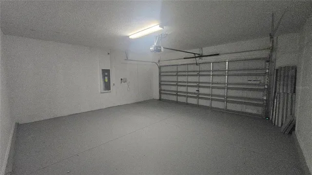 a view of room and racks on the wall