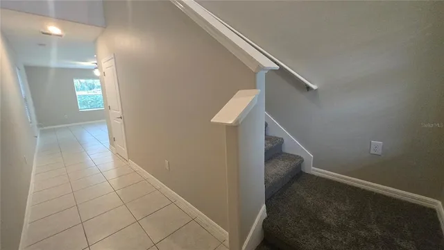 a view of hallway with stairs