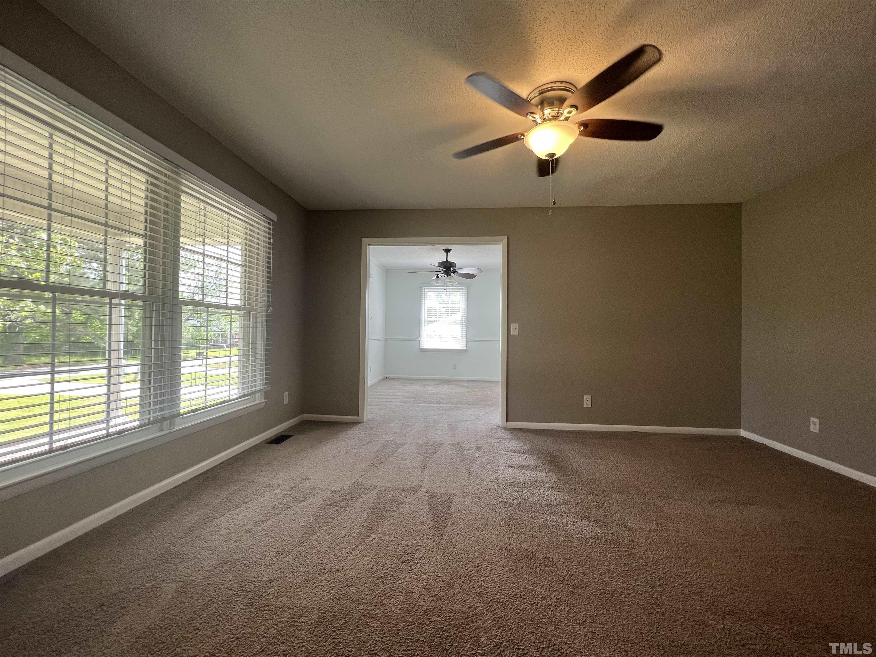 104 Marion Drive Erwin, NC 28339 - Photo 13 of 28 a view of an empty room with a window