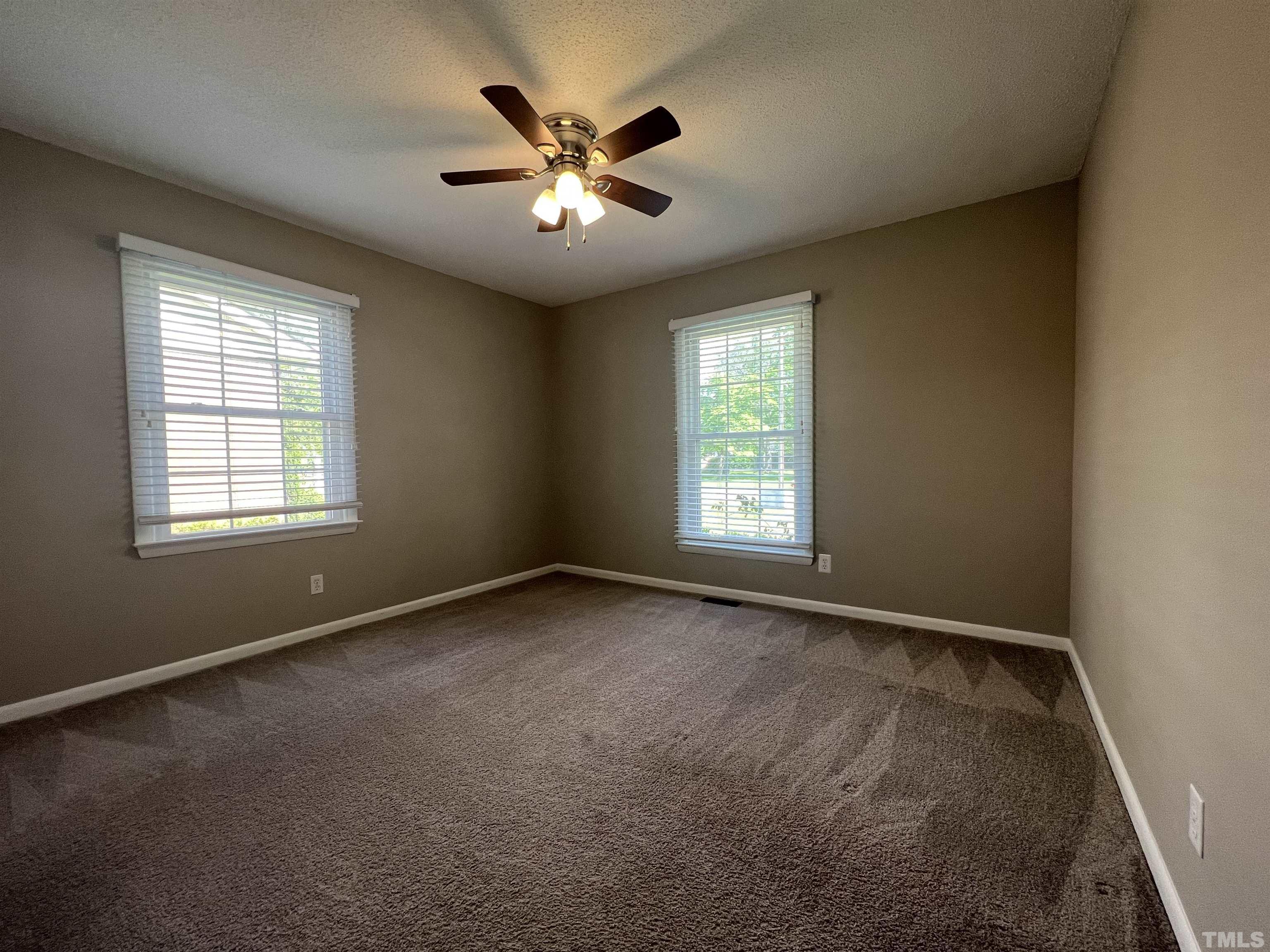 104 Marion Drive Erwin, NC 28339 - Photo 16 of 28 an empty room with a window