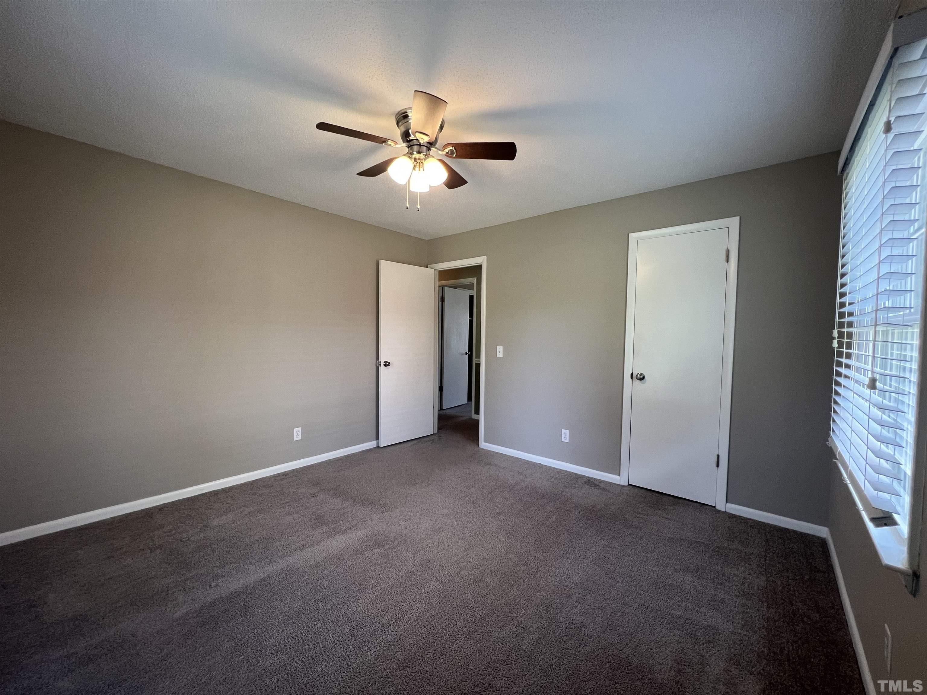 104 Marion Drive Erwin, NC 28339 - Photo 17 of 28 a view of an empty room with a window
