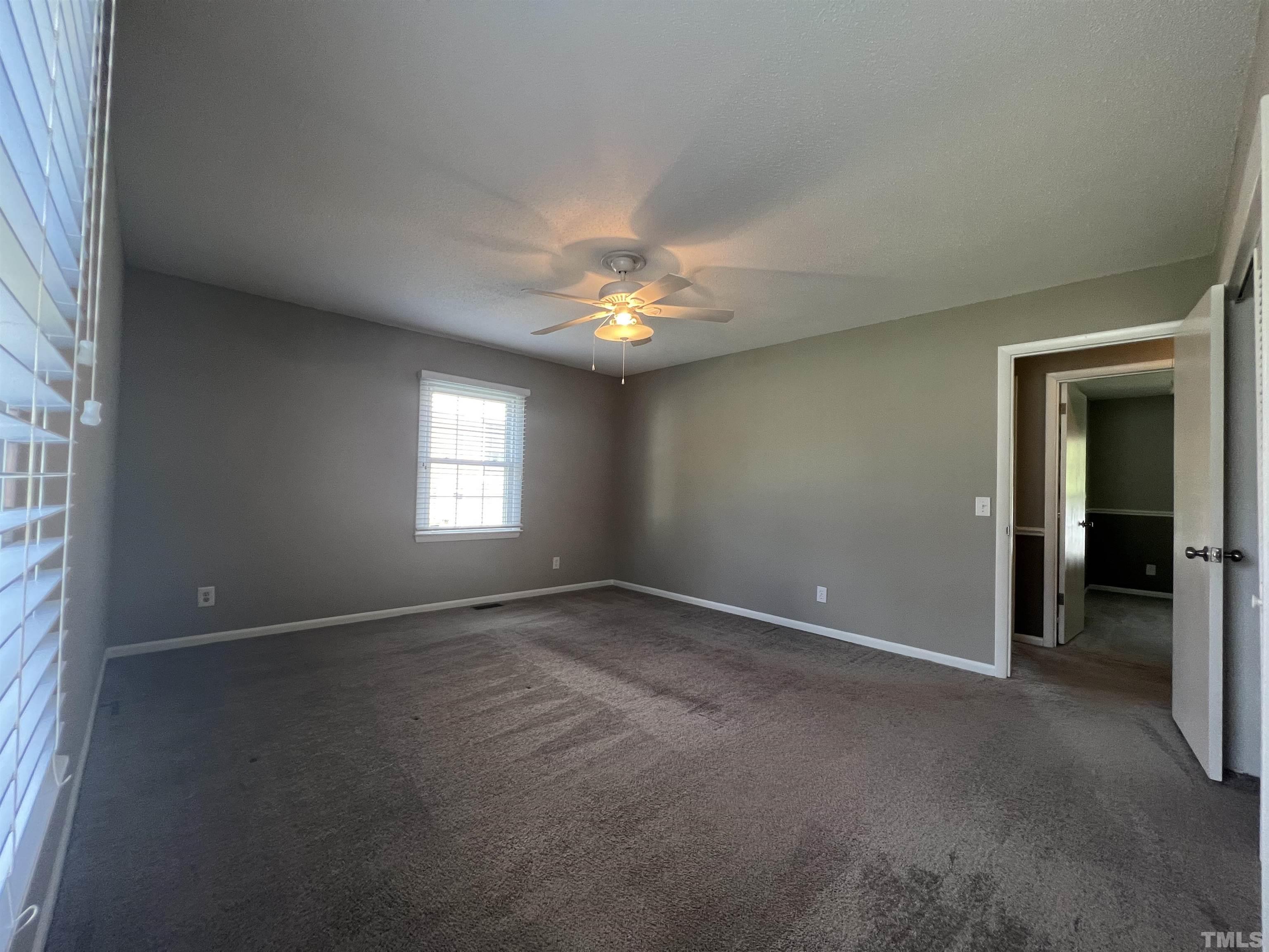 104 Marion Drive Erwin, NC 28339 - Photo 18 of 28 a view of an empty room with a window