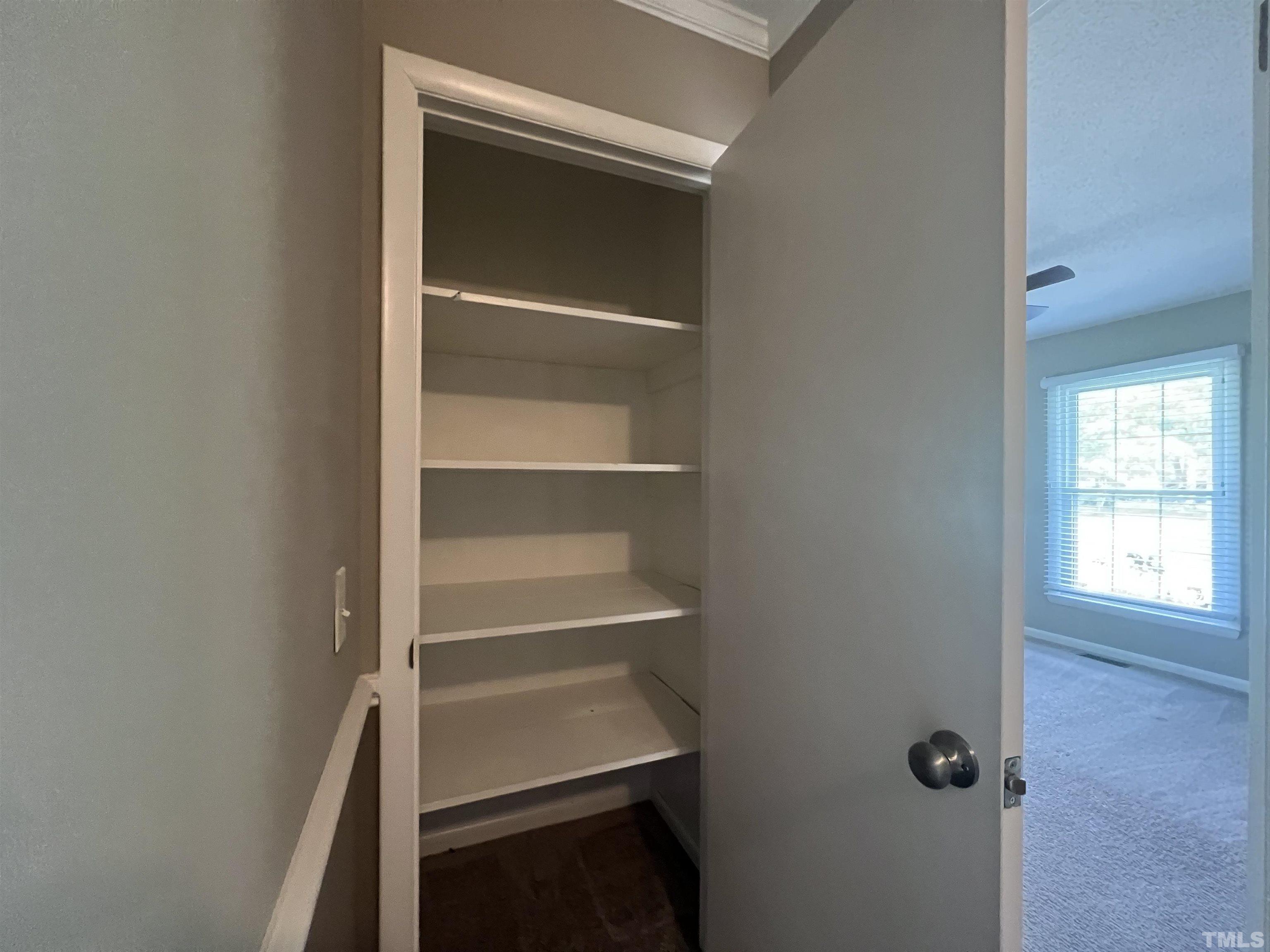 104 Marion Drive Erwin, NC 28339 - Photo 24 of 28 a view of an empty walk in closet