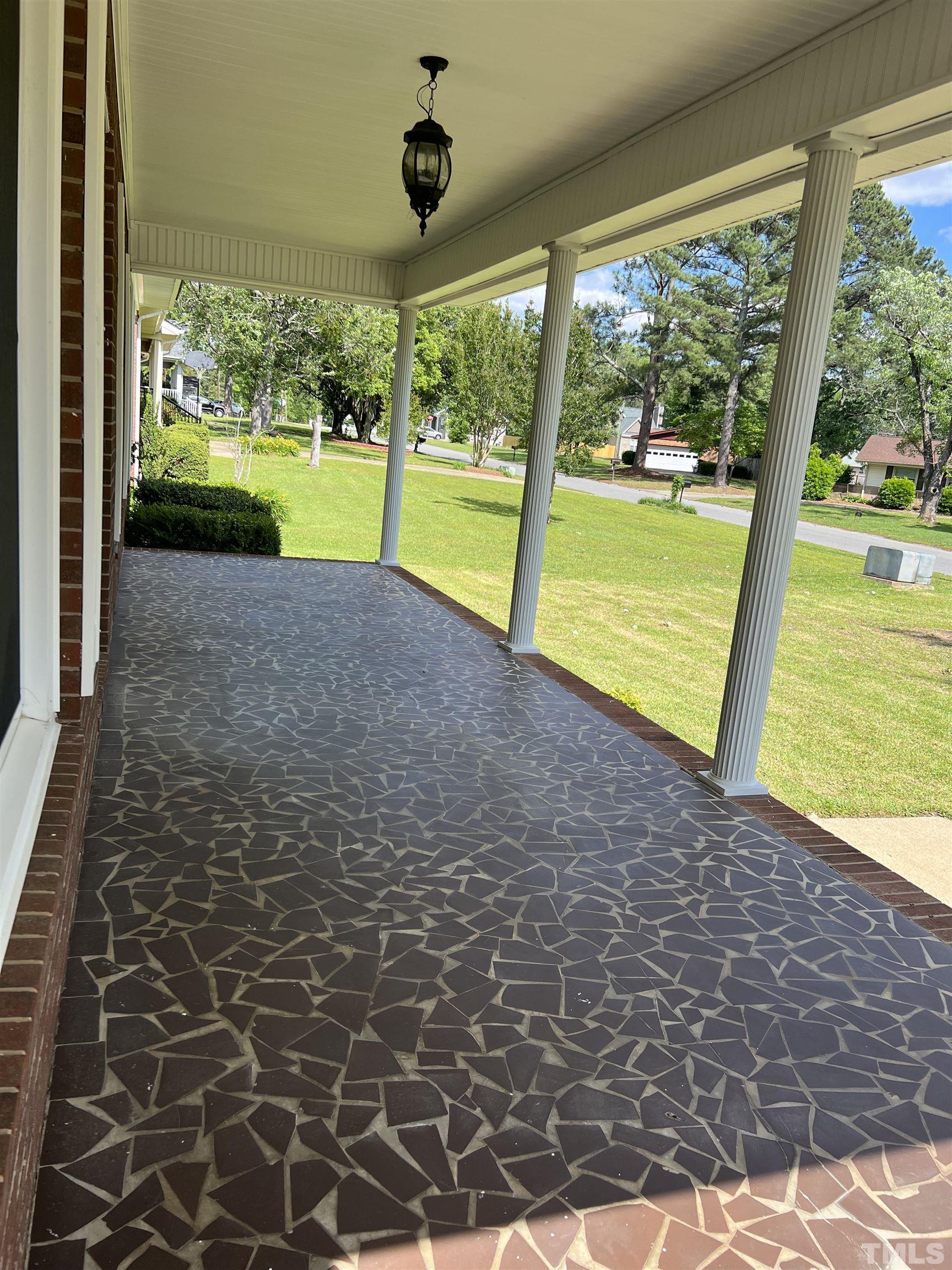 104 Marion Drive Erwin, NC 28339 - Photo 27 of 28 a view of an ocean & floor to ceiling window and an outdoor space