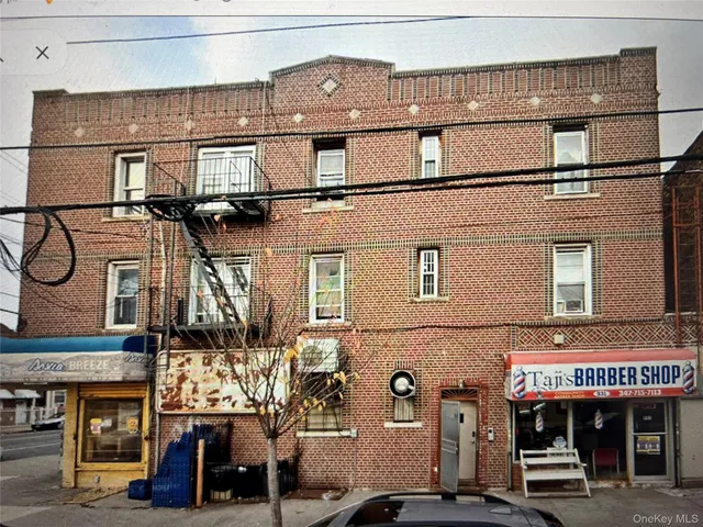 a front view of a building with street