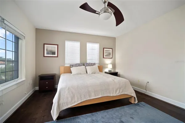 a bathroom with a sink double vanity granite and a mirror