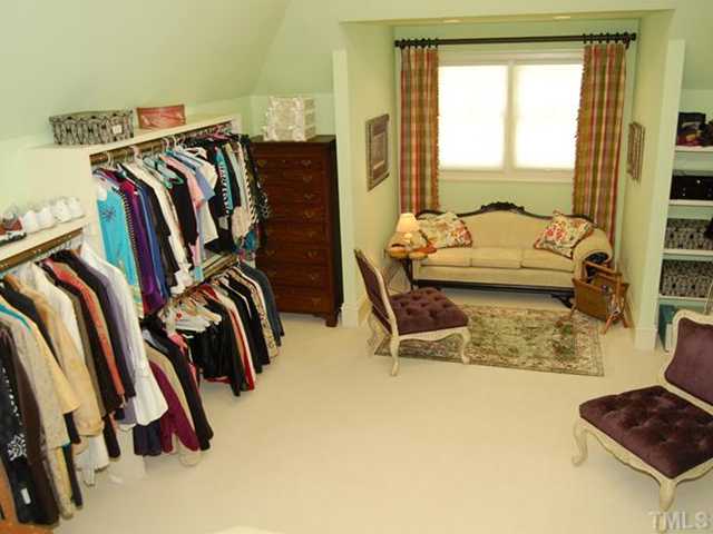 6024 Over Hadden Court Raleigh, NC 27614 - Photo 11 of 12 a view of walk in closet with clothes and shoes