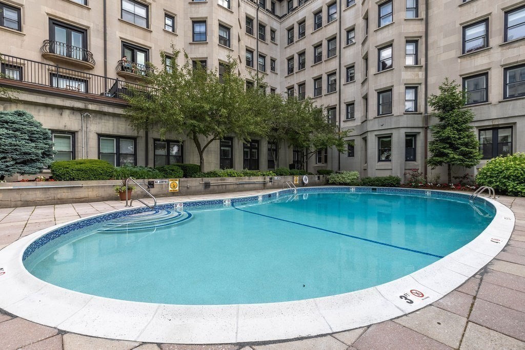 416 Commonwealth Avenue, Unit 212 Boston, MA 02215 - Photo 13 of 19 a view of a building with a swimming pool