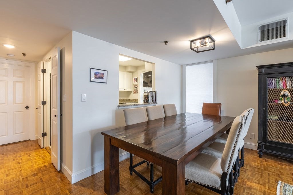 416 Commonwealth Avenue, Unit 212 Boston, MA 02215 - Photo 4 of 19 a view of a dining room with furniture