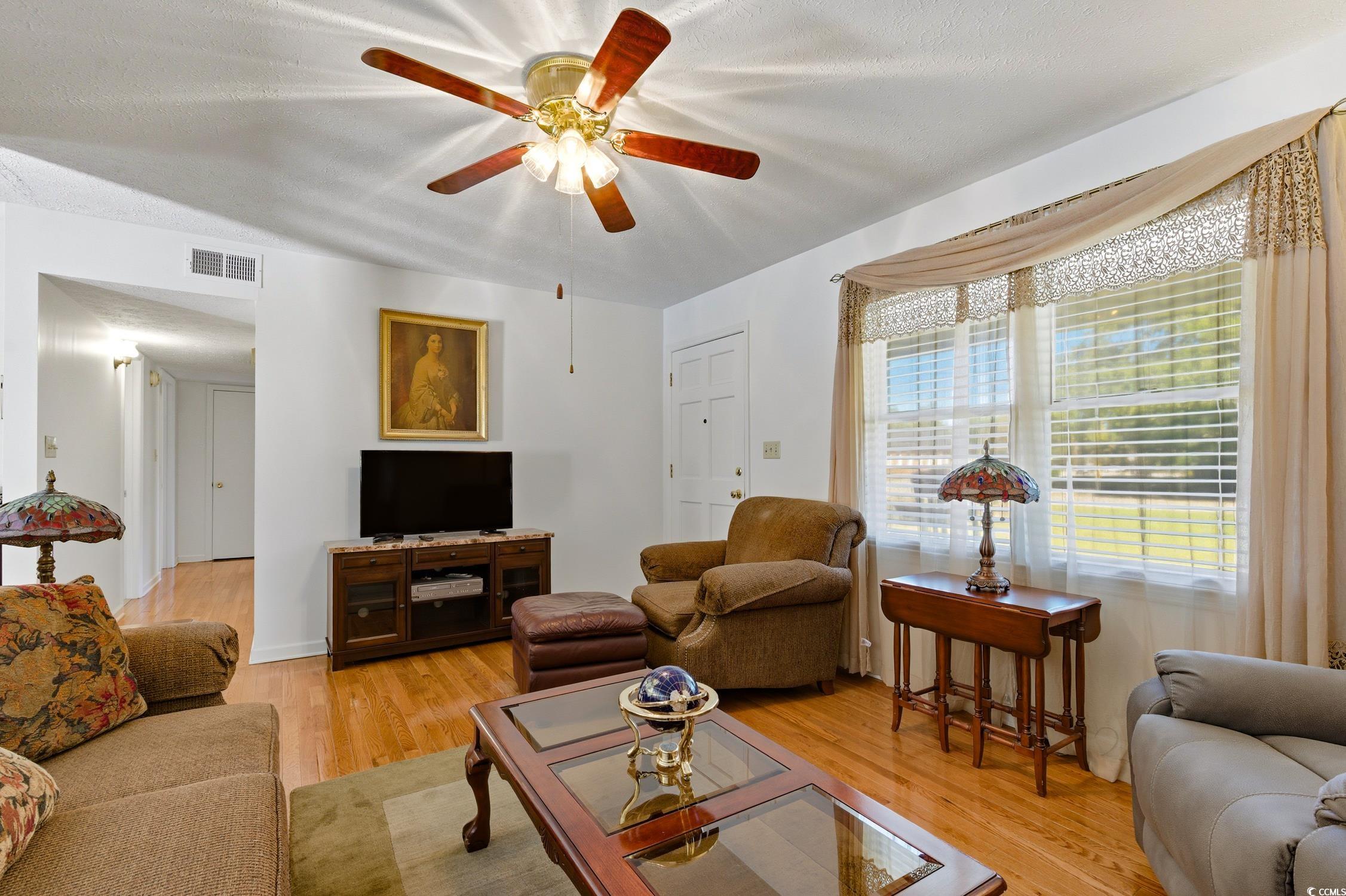 1605 Sessions Street Conway, SC 29526 - Photo 12 of 20 Living room with light wood-style floors and ceiling fan