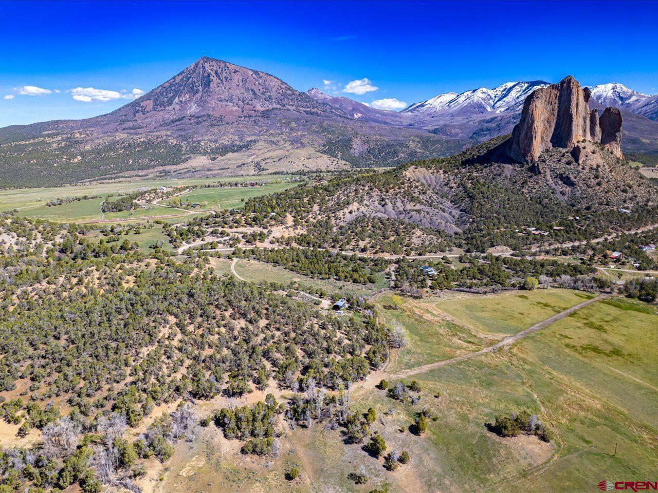 42996 Needle Rock Road Crawford, CO 81415 - Photo 11 of 45 a view of a city with mountains in the background
