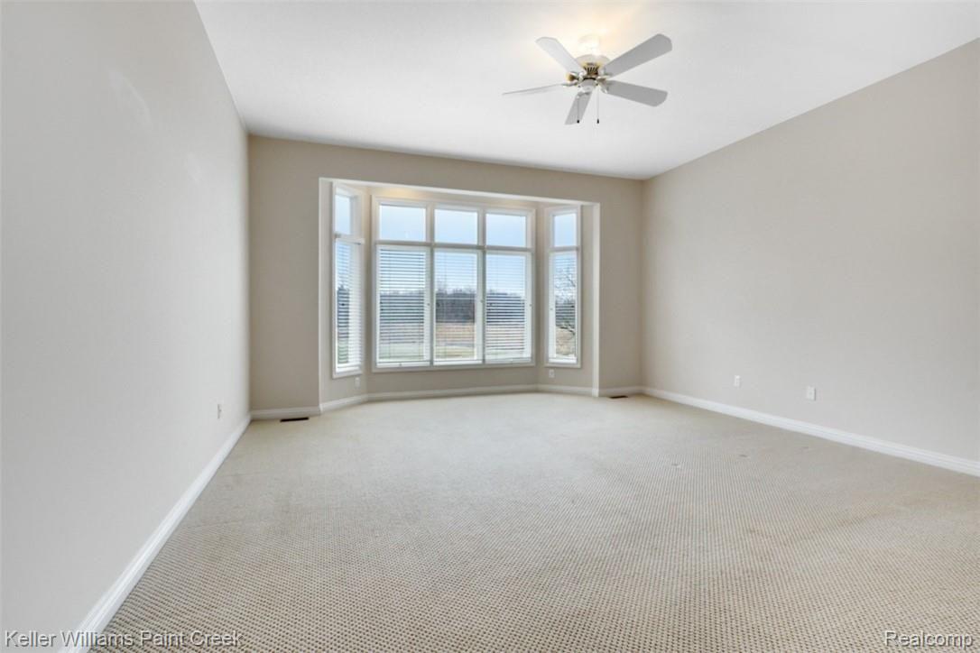 1400 Army Road Leonard, MI 48367 - Photo 27 of 56 First Floor Master Bedroom with beautiful bay window.