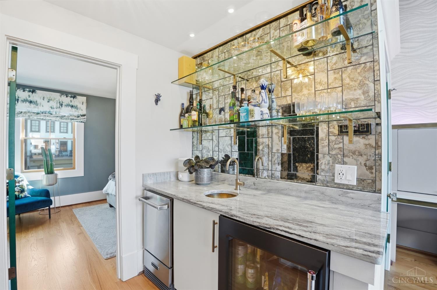 1338 Spring Street Cincinnati, OH 45202 - Photo 26 of 46 The owners installed a new beverage fridge and ice maker and re-designed the bar.