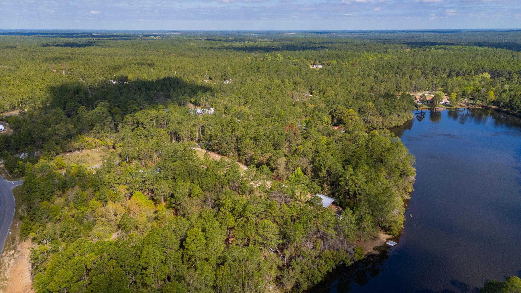 68 Beaver Dam Road DeFuniak Springs, FL 32433 - Photo 8 of 10 a view of lake with green space