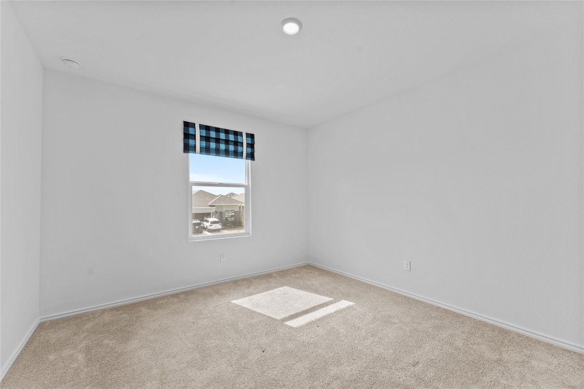 600 The Ugly Way Jarrell, TX 76537 - Photo 12 of 33 an empty room with a window