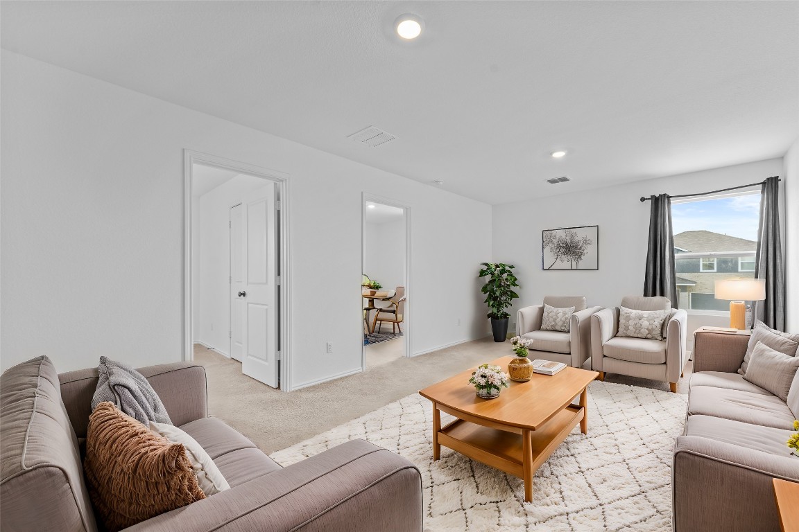 600 The Ugly Way Jarrell, TX 76537 - Photo 15 of 33 a living room with furniture and a large window