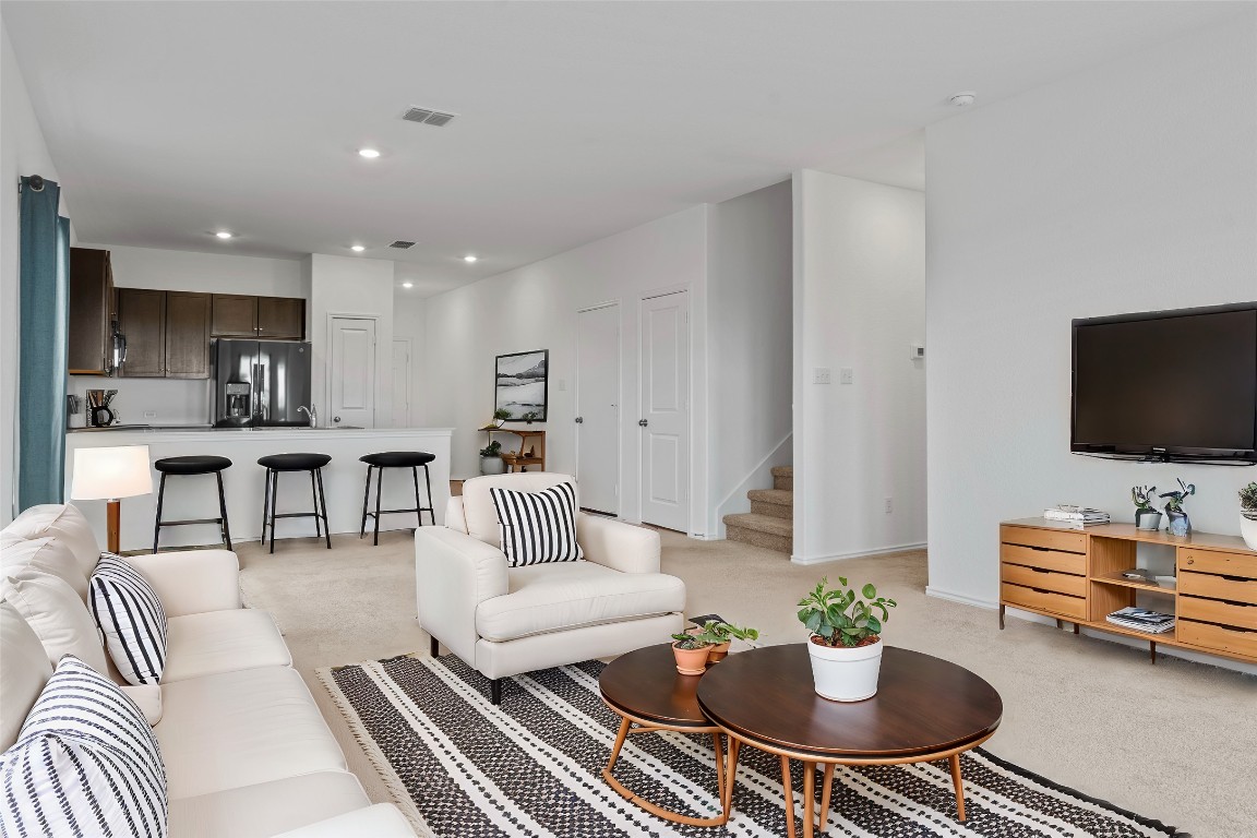 600 The Ugly Way Jarrell, TX 76537 - Photo 23 of 33 a living room with furniture and a flat screen tv
