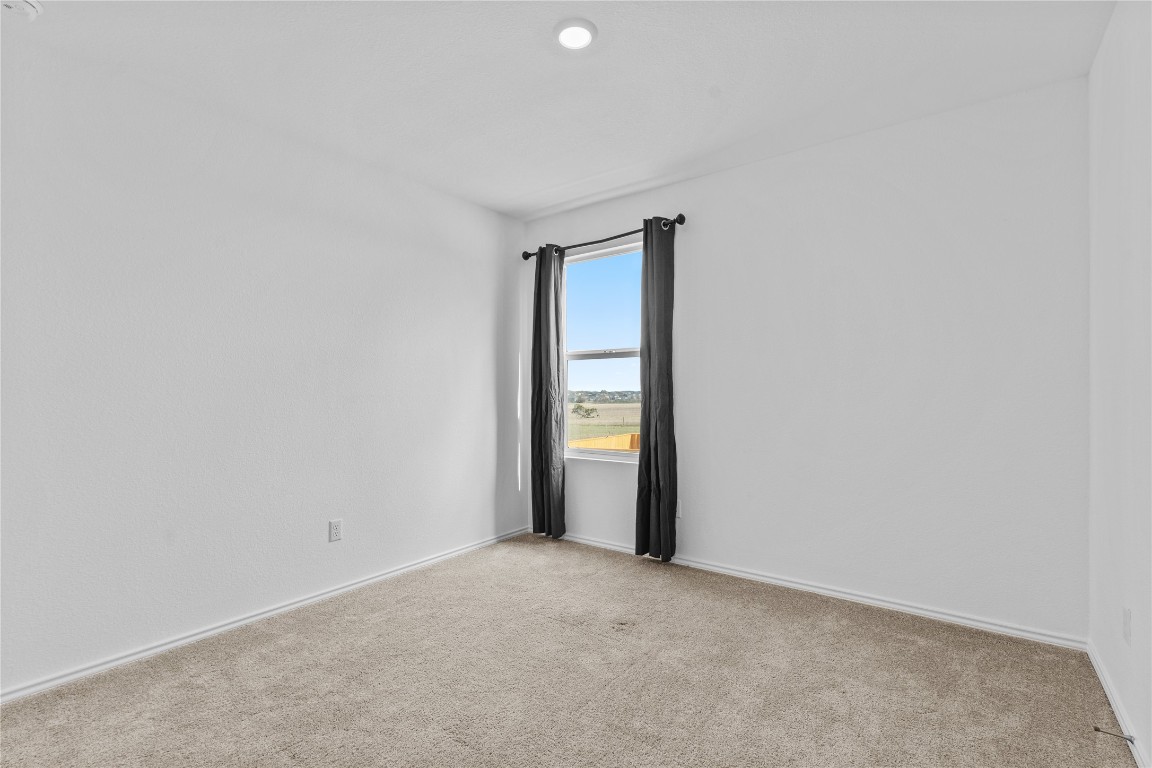 600 The Ugly Way Jarrell, TX 76537 - Photo 10 of 33 a view of an empty room with a window