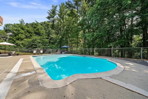 a view of outdoor space and swimming pool