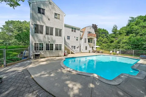 a view of a house with a swimming pool