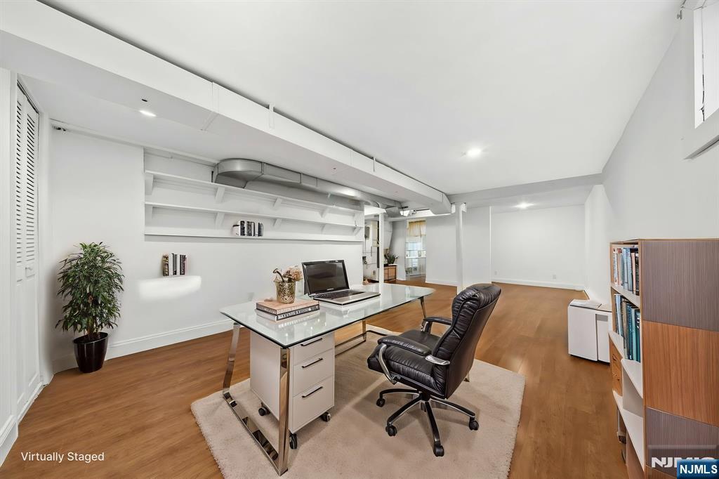 62 Sycamore Road Dumont, NJ 07628 - Photo 23 of 43 a workspace with furniture and a table