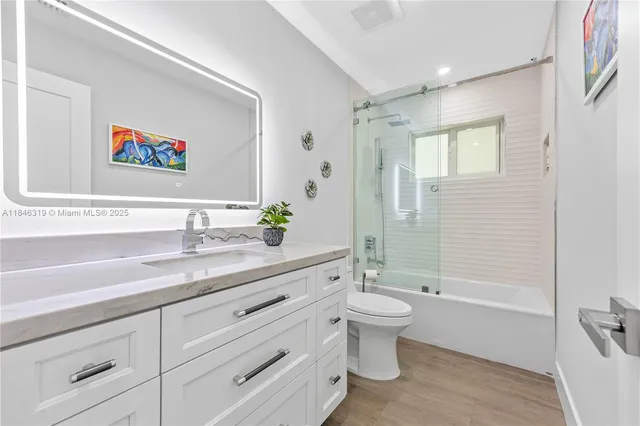 a view of a patio with a dining table and chairs