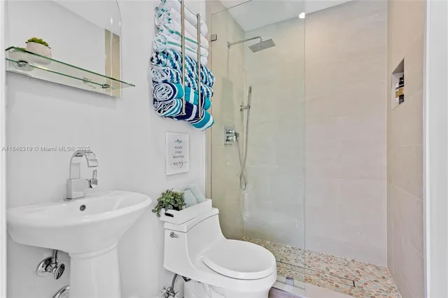 a kitchen with a table and chairs in it