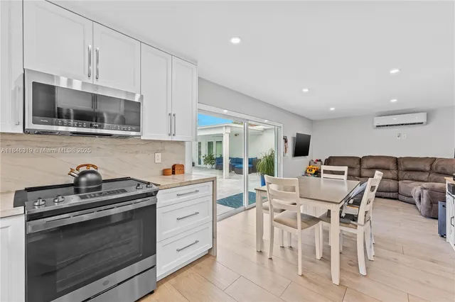 an aerial view of a house with a garden