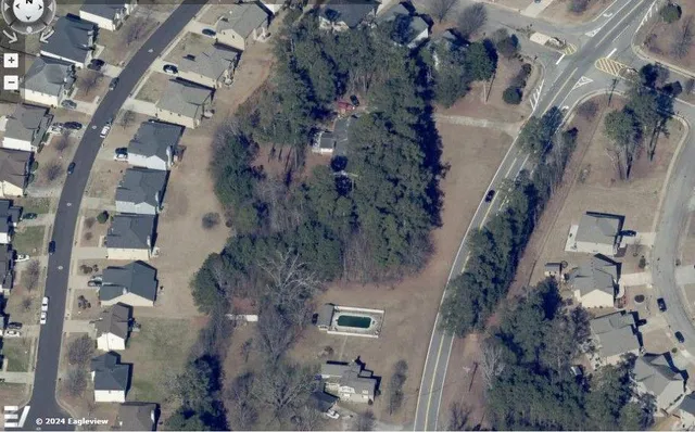 an aerial view of waterside residential houses