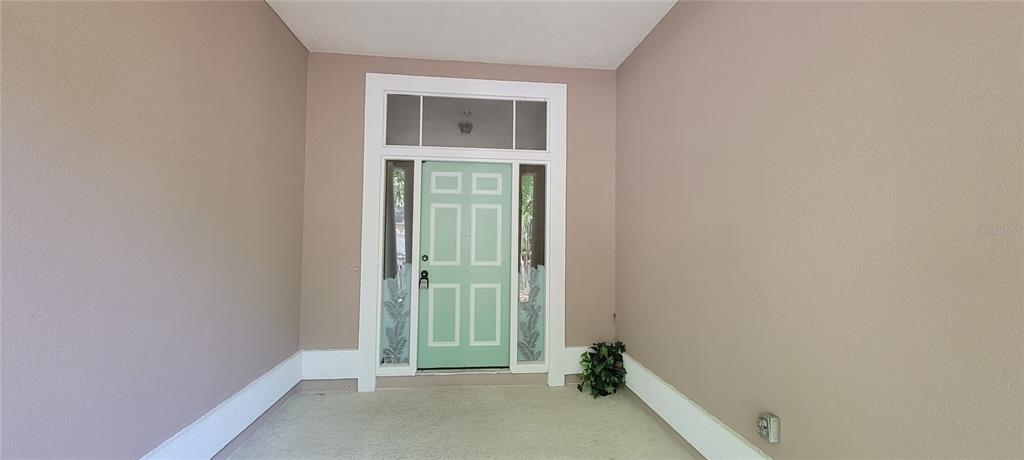 10050 Southwest 52nd Road Gainesville, FL 32608 - Photo 38 of 39 a view of an empty room with closet and a window