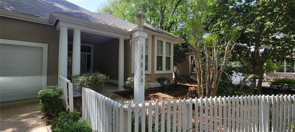 10050 Southwest 52nd Road Gainesville, FL 32608 - Photo 39 of 39 a house view with a garden space