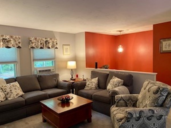 130 Reservoir Road Lunenburg, MA 01462 - Photo 5 of 23 a living room with furniture and painting on the wall
