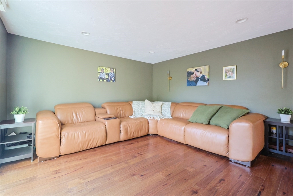 22 Rock Street Acushnet, MA 02743 - Photo 11 of 41 a living room with a couch