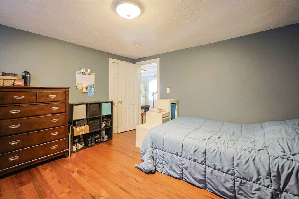 22 Rock Street Acushnet, MA 02743 - Photo 23 of 41 a bedroom with a bed and closet