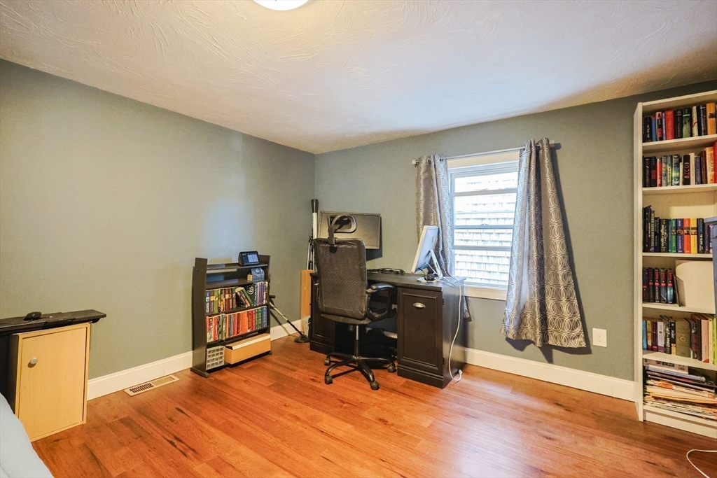 22 Rock Street Acushnet, MA 02743 - Photo 24 of 41 a view of a bedroom with workspace and a window