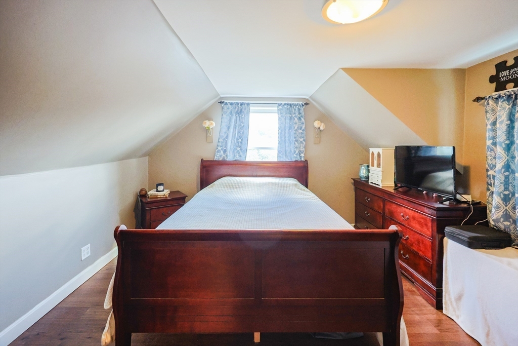 22 Rock Street Acushnet, MA 02743 - Photo 27 of 41 a view of a livingroom with furniture and a flat screen tv